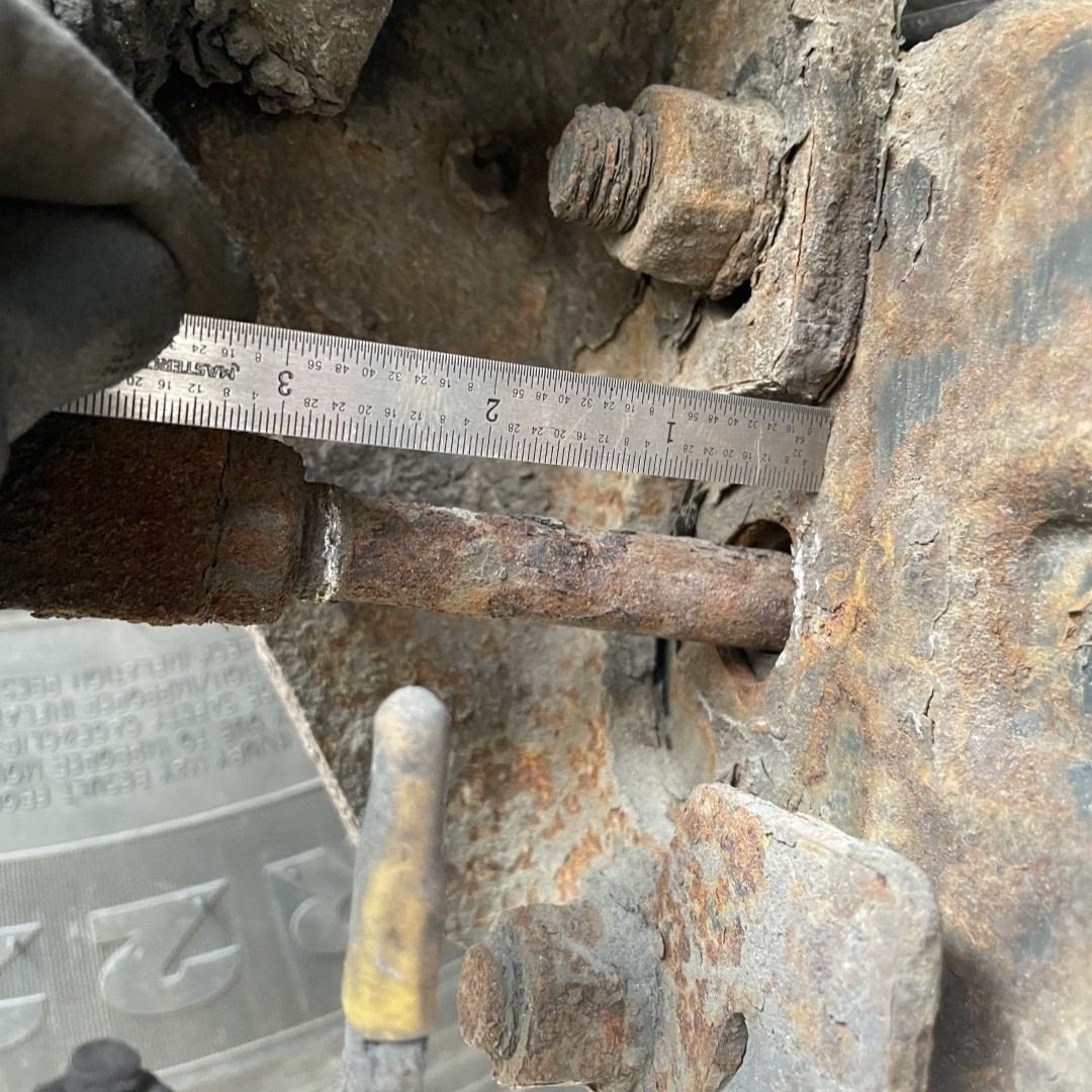 Close-up of rusted brake linkage out of adjustment during MTO inspection